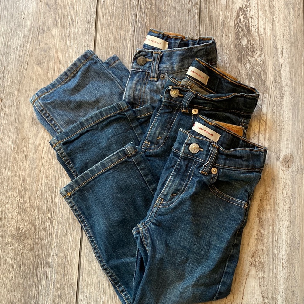 Three pair of 3T Levi’s 505 regular fit jeans.